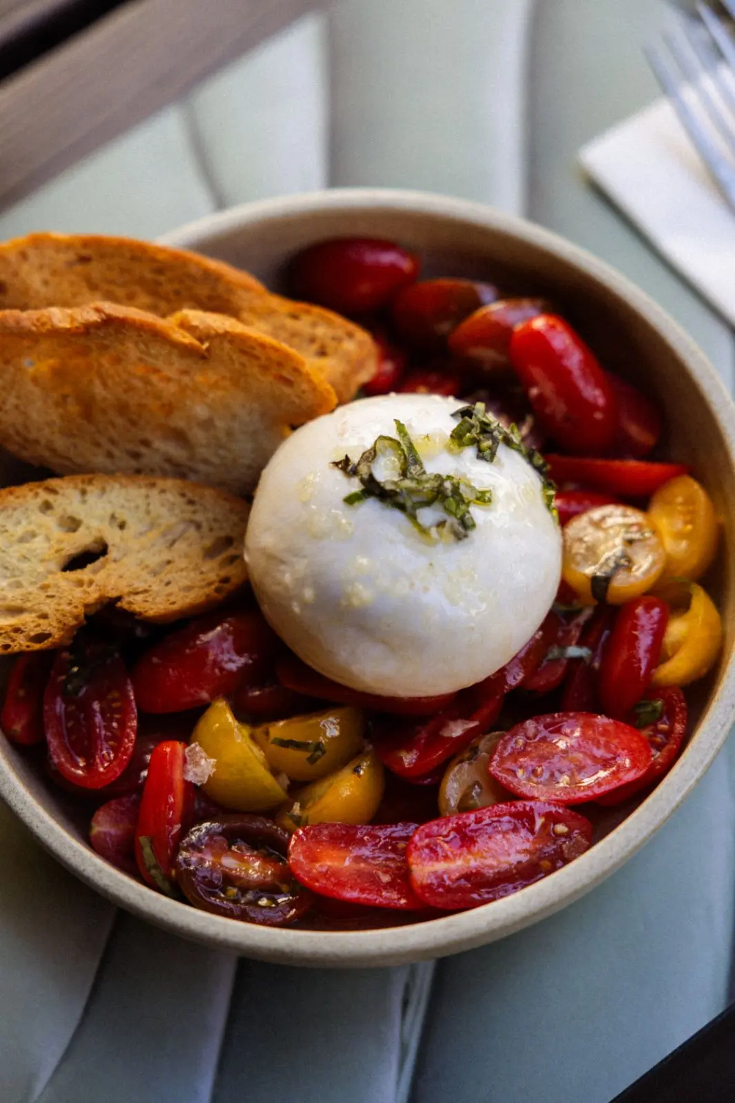 Creamy burrata cheese with fresh accompaniments